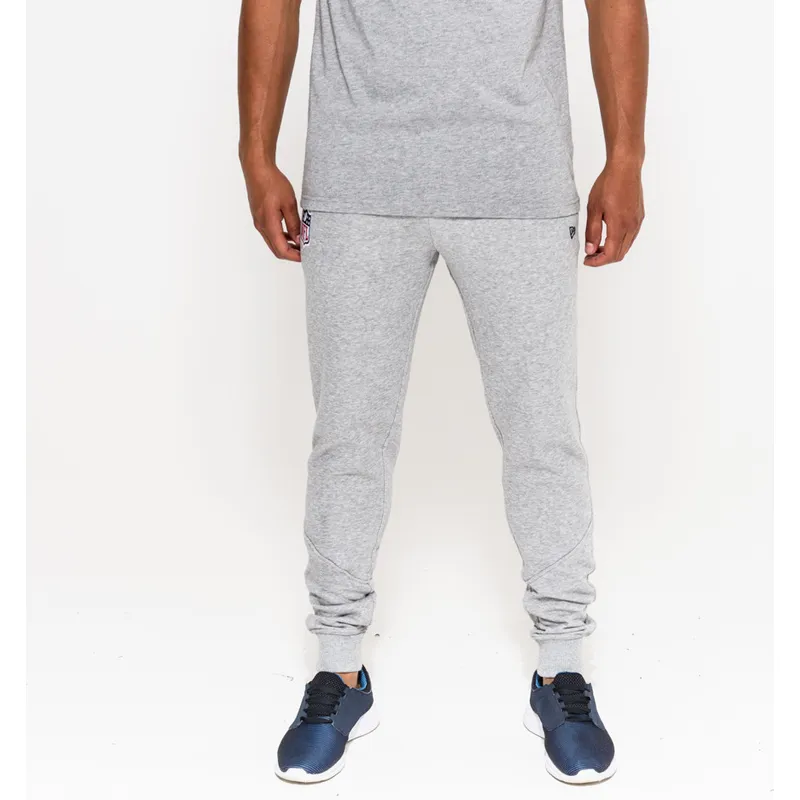 nohavice-dlhe-nohavice-siva-track-pant-nfl-new-era