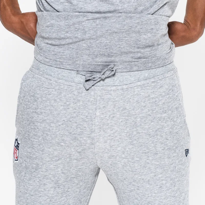 nohavice-dlhe-nohavice-siva-track-pant-nfl-new-era