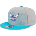 grau-blaue-snapback-kappe-9fifty-draft-edition-2023-der-charlotte-hornets-nba-von-new-era