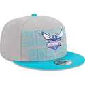 grau-blaue-snapback-kappe-9fifty-draft-edition-2023-der-charlotte-hornets-nba-von-new-era