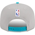 grau-blaue-snapback-kappe-9fifty-draft-edition-2023-der-charlotte-hornets-nba-von-new-era