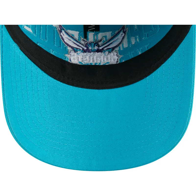 cap-zaoblena-blue-adjustable-strap-9twenty-draft-edition-2023-charlotte-hornets-nba-new-era