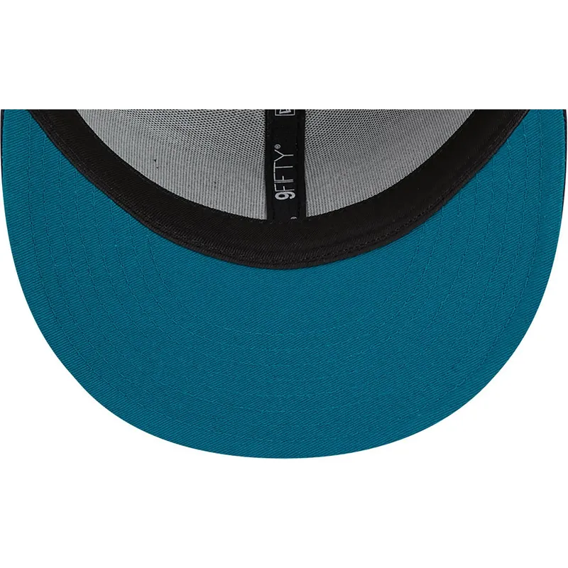 marineblaue-flache-snapback-kappe-mit-marineblauen-logo-9fifty-side-patch-script-der-new-york-yankees-mlb-von-new-era