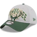 cap-zaoblena-gray-adjustable-strap-9twenty-tip-off-2023-milwaukee-bucks-nba-new-era