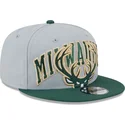 siltovka-rovna-siva-snapback-9fifty-tip-off-2023-milwaukee-bucks-nba-new-era
