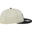 verstellbare-9fifty-retro-crown-denim-kappe-in-beige-und-schwarz-der-oakland-raiders-nfl-von-new-era