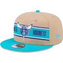 braune-und-blaue-snapback-kappe-9fifty-draft-2024-der-charlotte-hornets-nba-von-new-era