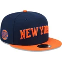 marineblaue-und-orangefarbene-flache-snapback-kappe-9fifty-statement-der-new-york-knicks-nba-von-new-era