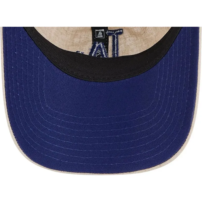 beige-verstellbare-curved-cap-mit-blauem-logo-9twenty-linen-spring-training-fan-pack-2025-der-los-angeles-dodgers-mlb-von-new-er