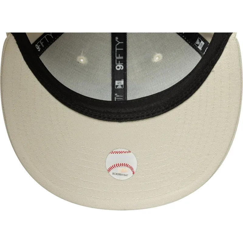 beige-flatcap-snapback-mit-beigem-logo-9fifty-original-fit-world-series-der-new-york-yankees-mlb-von-new-era