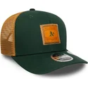 grune-und-braune-trucker-kappe-9seventy-stretch-snap-debossed-logo-der-oakland-athletics-mlb-von-new-era