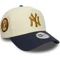 new-era-curved-brim-9forty-e-frame-world-series-patch-new-york-yankees-mlb-beige-and-navy-blue-snapback-cap