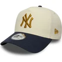 new-era-curved-brim-9forty-e-frame-world-series-patch-new-york-yankees-mlb-beige-and-navy-blue-snapback-cap