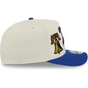 gorra-curva-beige-y-azul-snapback-9fifty-a-frame-precurved-hardwood-classics-de-philadelphia-76ers-nba-de-new-era