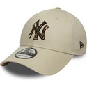new-era-curved-brim-9forty-camo-infill-new-york-yankees-mlb-beige-adjustable-cap