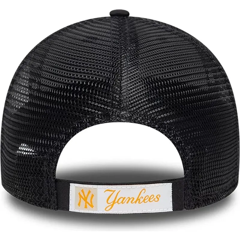 marineblaue-verstellbare-trucker-kappe-mit-orangefarbenem-logo-9forty-homefield-midi-der-new-york-yankees-mlb-von-new-era