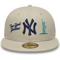 beige-angepasste-flatcap-mit-marineblauem-logo-59fifty-city-icon-der-new-york-yankees-von-new-era