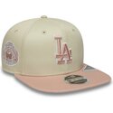 beige-snapback-flatcap-mit-rosa-logo-9fifty-original-fit-world-series-patch-der-los-angeles-dodgers-mlb-von-new-era